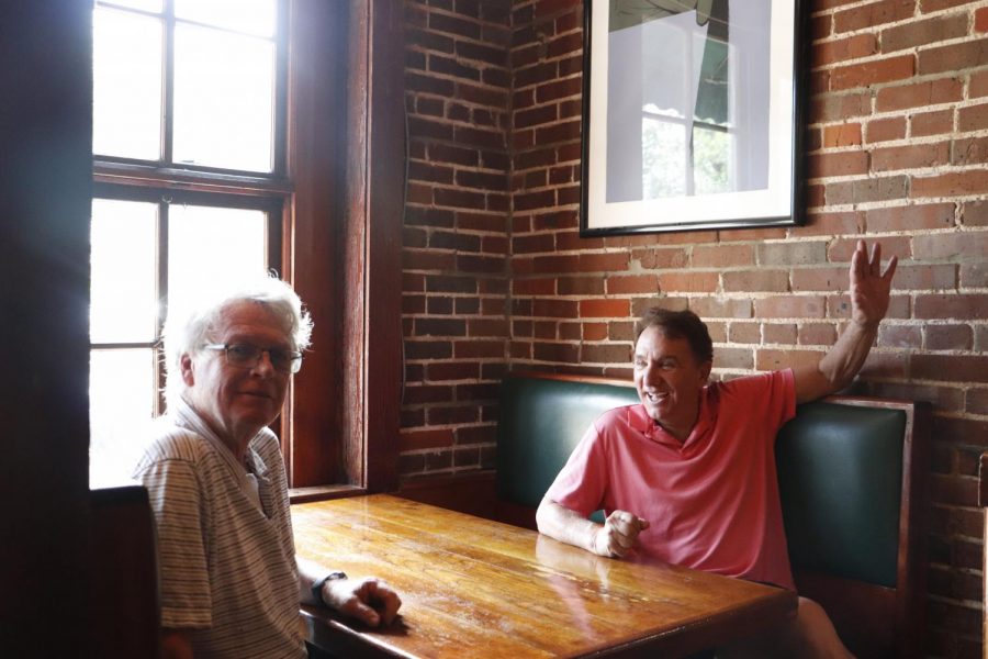 Paul Murphy (left) and Rick Colucci sit in a booth at Brady's Restaurant on SW Railroad Avenue in Downtown. They co-own three restaurants: Jacmel Inn and Brady's in Hammond and Nuvolari's in Mandeville. The two have been business partners for over 40 years and have had an even longer friendship.