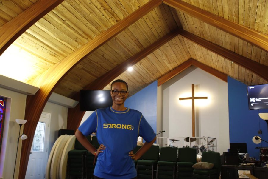 Junior music major Taleya Jordan stands inside the Southeastern Wesley Foundations Methodist Church, the location for the weekly Queer Communion meetings. Jordan created the group as a safe space for queer Christians to come together for bible study every Wednesday at 6:30 p.m.