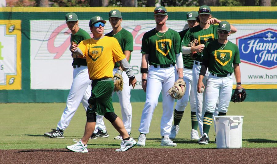 Ford Pemberton works with the baseball team during practice. Previously on the Nicholls State University baseball coaching staff, Pemberton joined the Lions in September as hitting coach and camp coordinator.