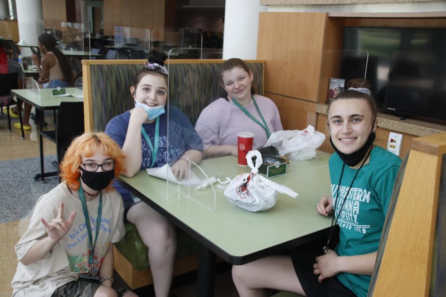 Students with masks sit in the designated eating area of the Student Union to eat lunch during the first week of the Fall 2021 semester. Southeasterns campus mask mandate remains in place following Gov. Edwards announcement on Oct. 26 to lift the statewide mandate.