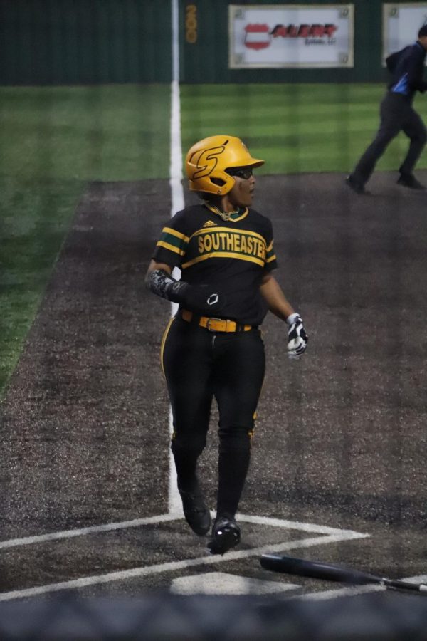 Two out on the board, senior outfielder Aeriyl Mass stationed at third make a shot for home. Redhawks get third out for the end of the inning with no points scored.