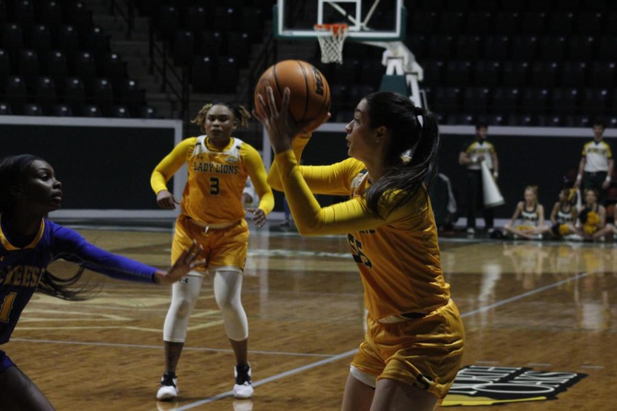 Sophomore guard Hailey Giaratano attempts to take a shot after a steal in the Feb. 11 game against McNeese in the University Center.