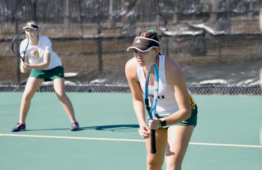 Jordan Burdett (right) and Sonya Kanarskaya engage in doubles play at the Southeastern Tennis Complex for the Feb. 15 match.