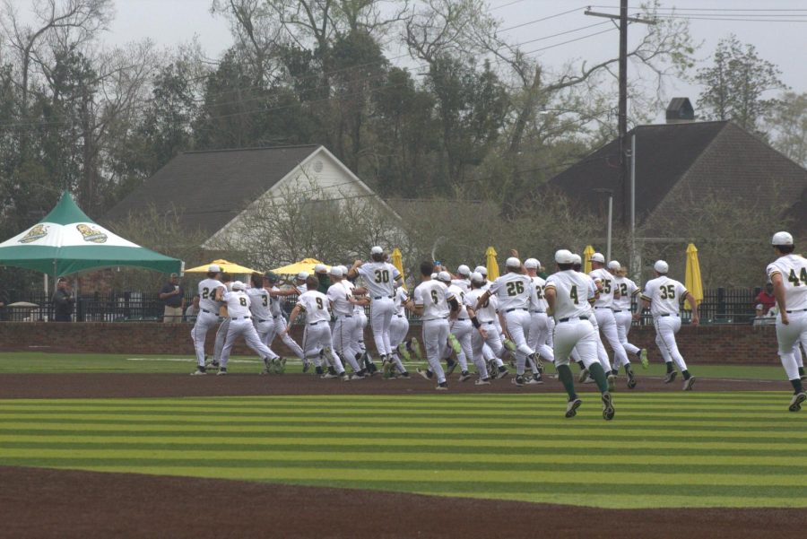 Southeastern baseball players celebrate dramatic 2-1 victory over Tennessee Tech in 10 innings on March 11 at Alumni Field.