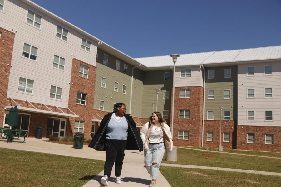Students+walk+to+class+outside+of+Ascension+Hall.+Housing+and+Roommate+applications+for+the+2022-2023+School+year+are+now+available.+