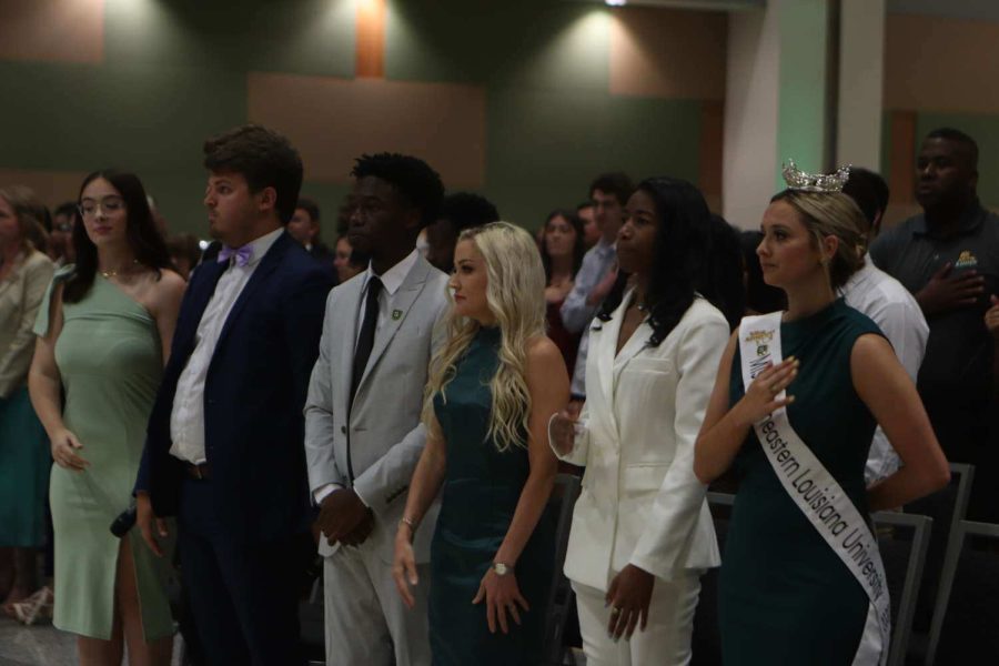 Miss Southeastern and other audience members standing for the opening parts of the ceremony. DSA Convocation took place on April 26, where students where given acknowledgement and awards for their impact on campus.