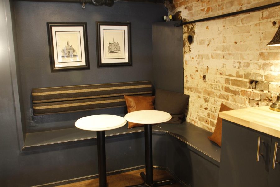 This bright corner attracts the eye. This corner seat is on the second floor of Luma Coffee which gives a view of the coffee shop and outside.