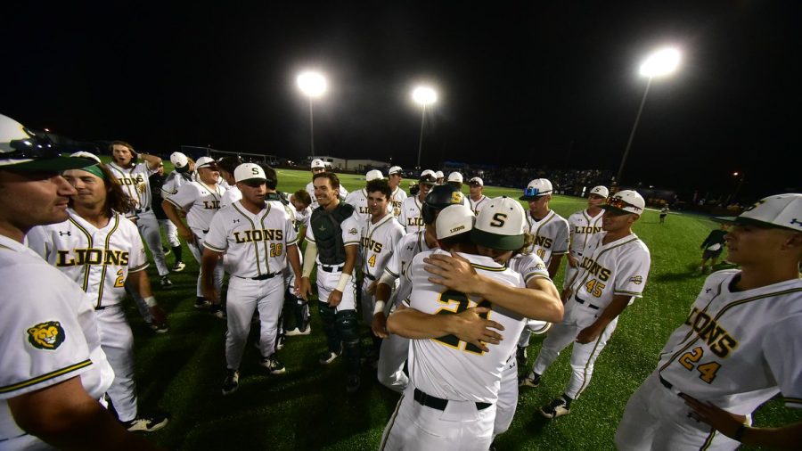 The SLU Lions baseball team celebrate their special victory over the McNeese Cowboys.