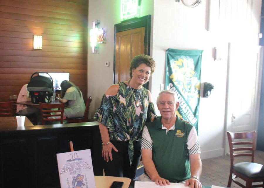 Larry Hymel (right) and his daughter Kayla Hymel Tomeny pose for a picture at Roux & Brew Seafood and Steak House in Ponchatoula during his book signing on June 18.