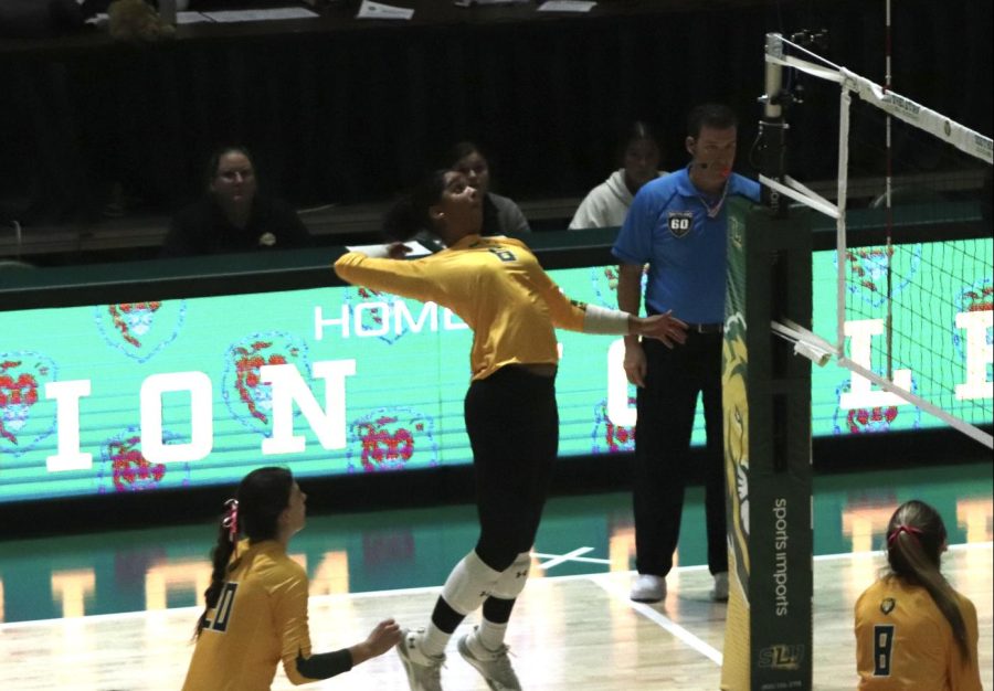 Junior+outside+hitter+Kailin+Newsome+gets+a+spike+to+give+Southeastern+a+one-point+advantage+during+the+teams+victory+over+Texas+A%26M-Corpus+Christi+Thursday+night+at+the+University+Center.+%28Oct.+20%29