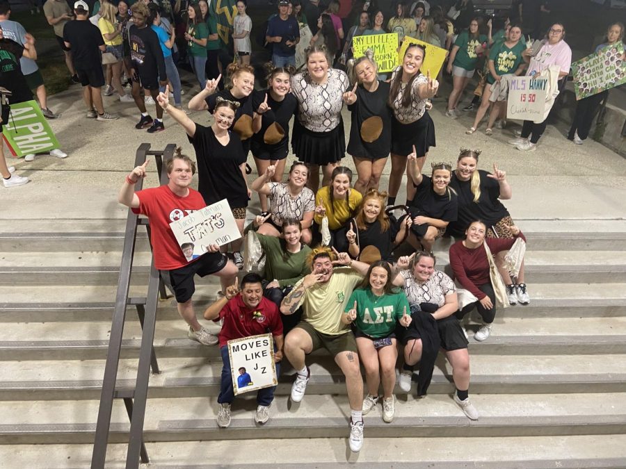 Winners of the 2022 Lip sync battle Alpha Sigma Tau and Theta Chi lion up as they celebrate their win. The team won first place with their Jumanji themed dance and lip sync routine. 