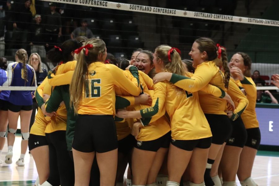 SLU players celebrate on the court after advancing to the Southland Conference Tournament Championship game. The team beat HCU in the semifinals on Saturday 3-1 (25-22, 27-29, 25-22, 25-21). (Nov. 19, 2022)