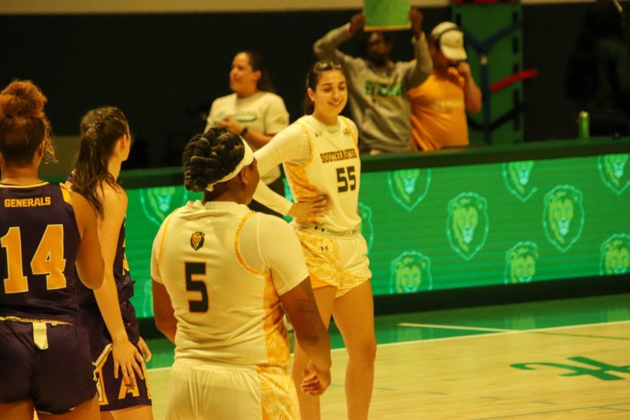 Hailey Giaratano and Taylor Bell on the court just before tip-off vs. LSUA in SLUs 2022-23 season opener at the University Center. (Nov. 7, 2022)