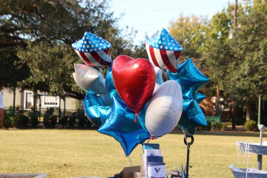 The Veterans Day Celebration in Cate Street Park honored local veterans with food, gift baskets, and American-themed decorations.