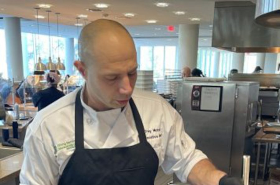 Chef Trey blends flavors together during the shrimp and grits pop-up in the Mane Dish. Chef Trey looks forward to bringing new and old food events to students.