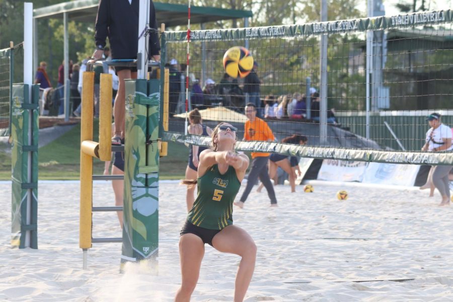Senior beach volleyball player and Hammond native Eryn Wilks performs a bump during SLUs 3-2 defeat to UTEP Wednesday at the Southeastern Beach Volleyball Complex. (March 15, 2023)