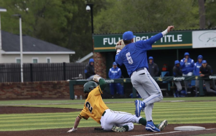 Fifth-year senior center fielder Tyler Finke slides in safely at third base during Southeasterns 6-1 victory over Memphis on Saturday in game two of the series at Alumni Field. (March 18, 2023)