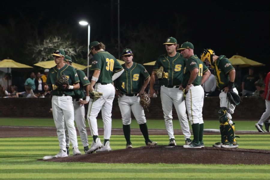 Lions talk things over on the mound during a 5-2 defeat to UIW at Pat Kenelly Diamond at Alumni Field. (April 1, 2023)