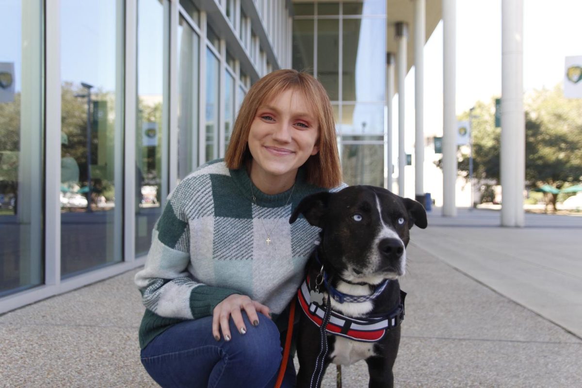 Symiah Dorsey won 2nd Best Feature Photo from her picture of 22-23 SGA President Baleigh Picou and her service dog Bruno. 