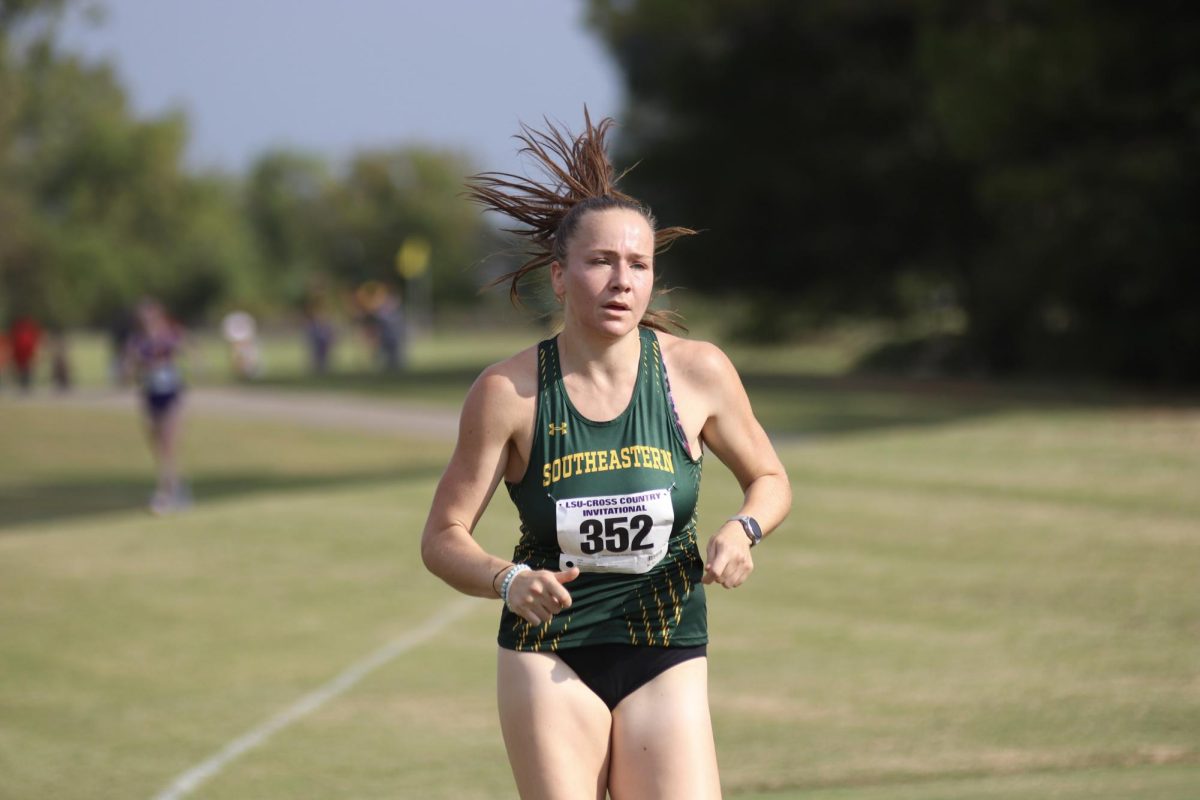 Newcomer+Nikola+Vimmerov%C3%A1+makes+her+way+down+the+4k+course.+The+Lions+competed+in+the+annual+LSU+Invitational+on+Friday%2C+Sept.+15.+