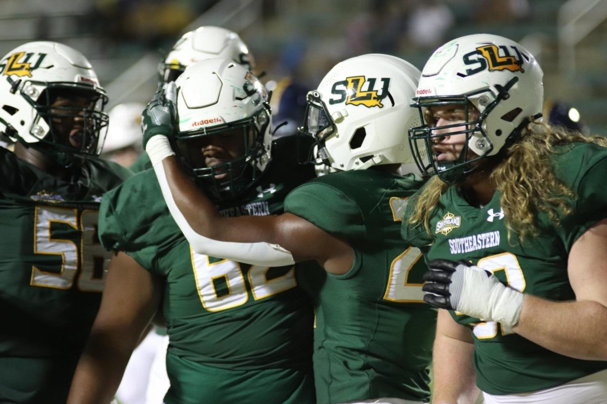 SLU+players+celebrate+their+48-14+win+over+Murray+State+last+season+at+Strawberry+Stadium.+%28Oct.+1%2C+2022+-+Hammond%29