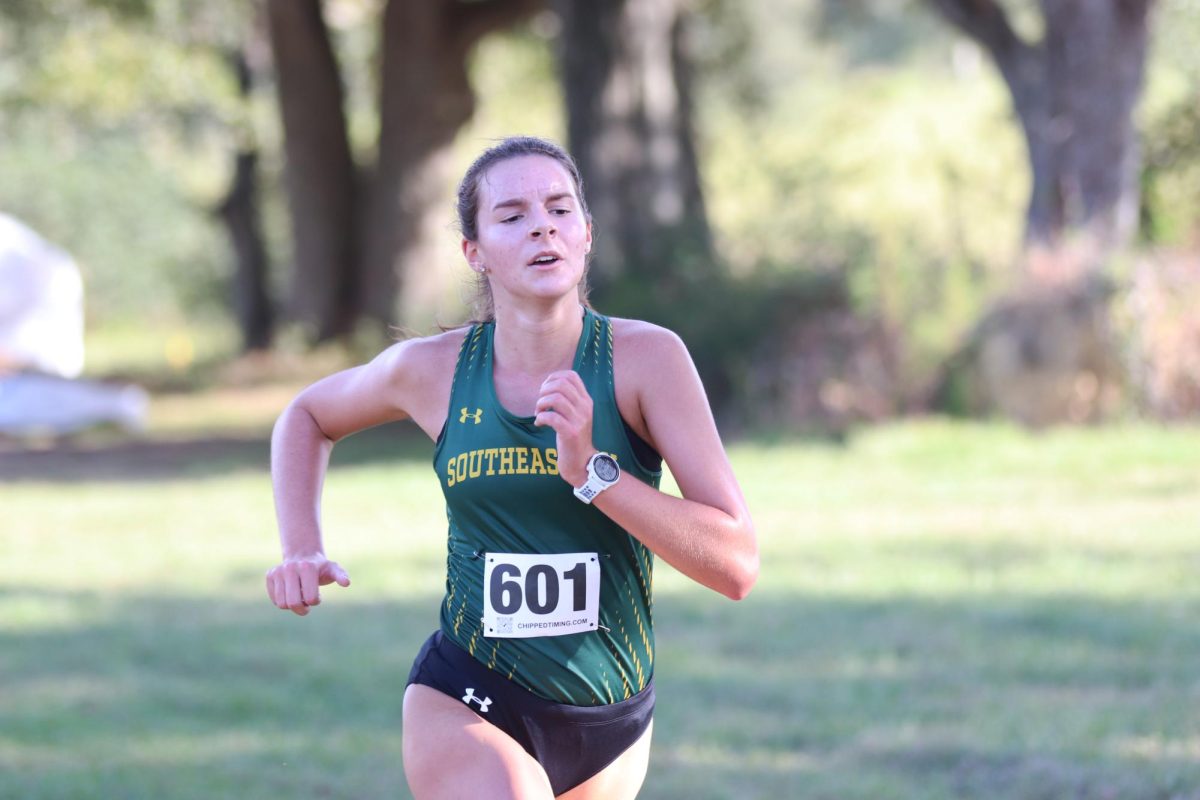 Freshman Ava Pitarro surges through the final straightaway of the womens 5k. Pitarro finished second on her team and top ten overall in the SLU Lion Up Invitational. 