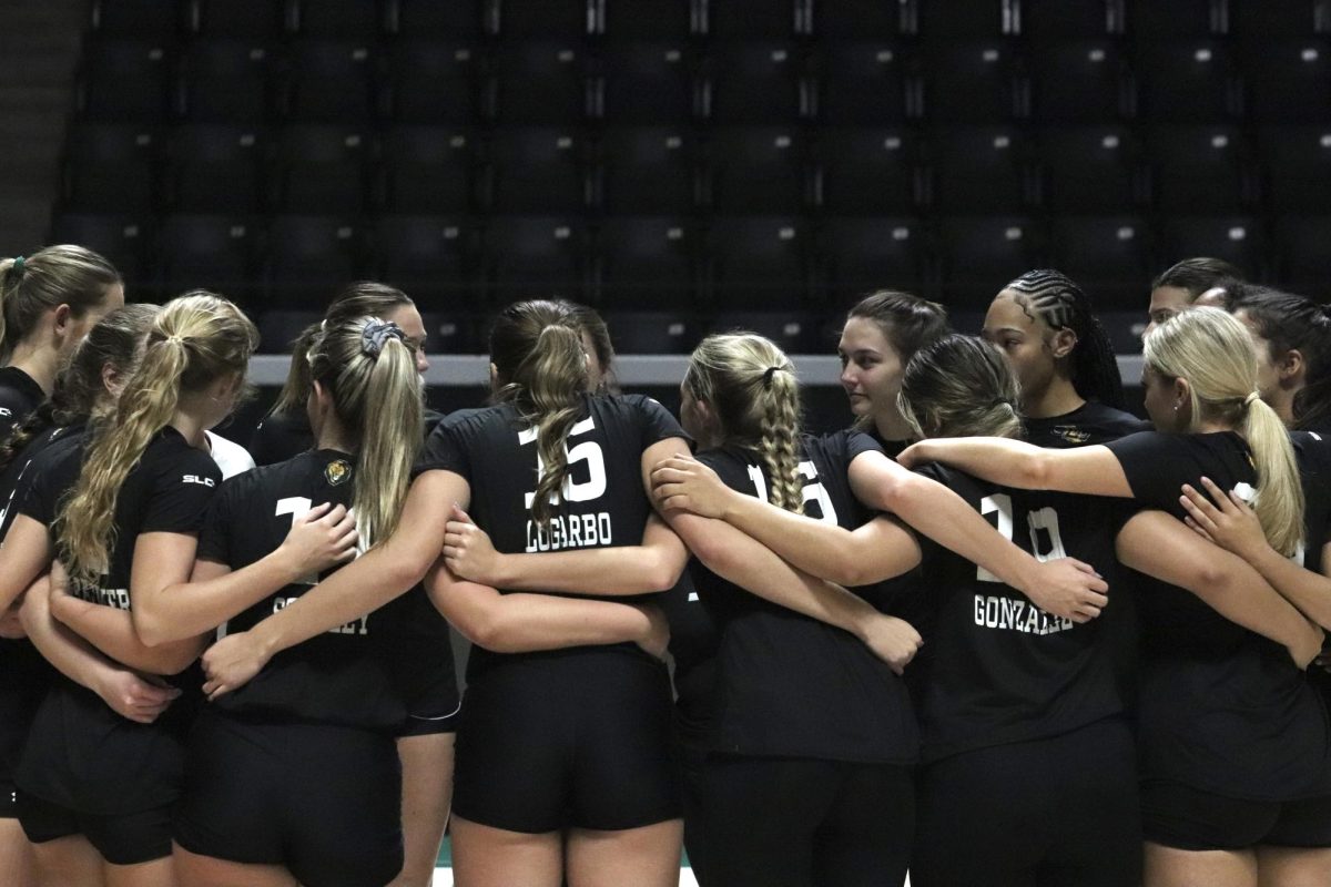 Lady Lions join together for group hug and pep talk in preparation for a game against Texas A&M-Commerce. (Sept. 30th, 2023 - Hammond) 