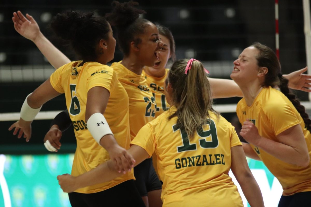 Lady Lions celebrate a point during sweep of Nicholls earlier in season at the PRUC. (Oct. 26, 2023 - Hammond)