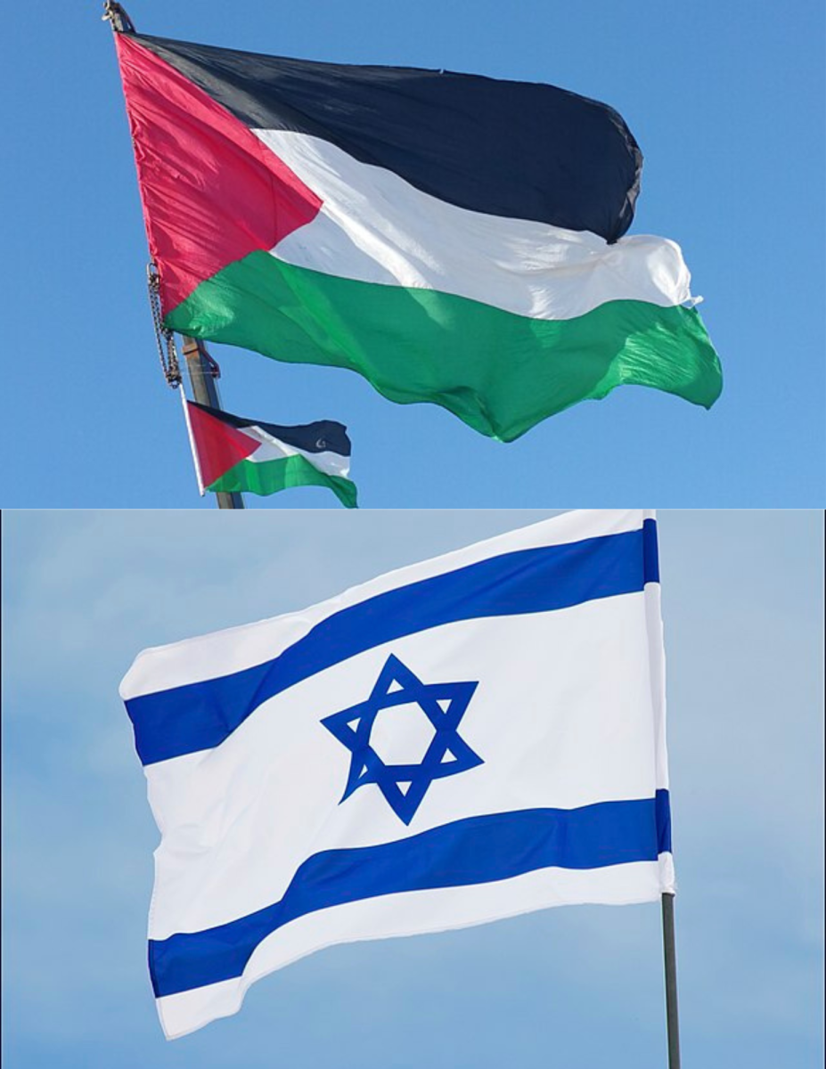 The Palestinian and Israeli flags billow in the air. 