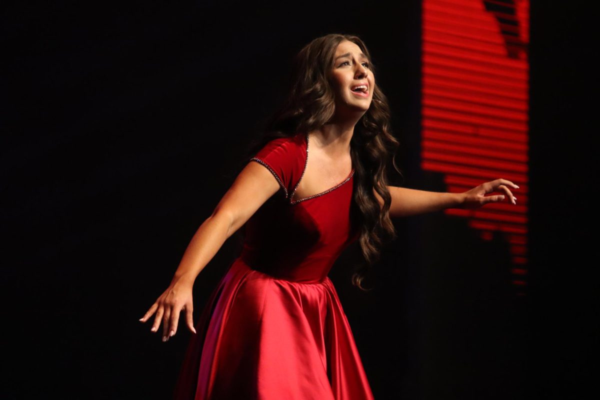 Miss Southeastern 2023 singing on the Miss Louisiana stage after being named as one of the final 10.
