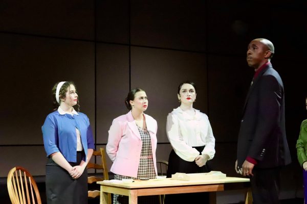 Ashton Persick, Lanie LeFranc, Annabelle Snow and DeJuan James acting out the story of the Radium Girls for the audience on preview night Wednesday, Jan. 31