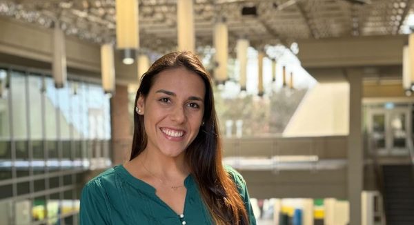 Brazilian graduate student Thais Lindemayer Gomes represents Southeastern Pride and the community of international students at SLU.