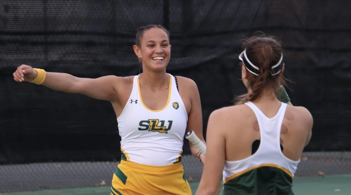 SLU duo Bente Bierma and Alba Perez celebrate their doubles victory against Southern at the Southeastern Tennis Complex. (Feb. 22, 2024 - Hammond)