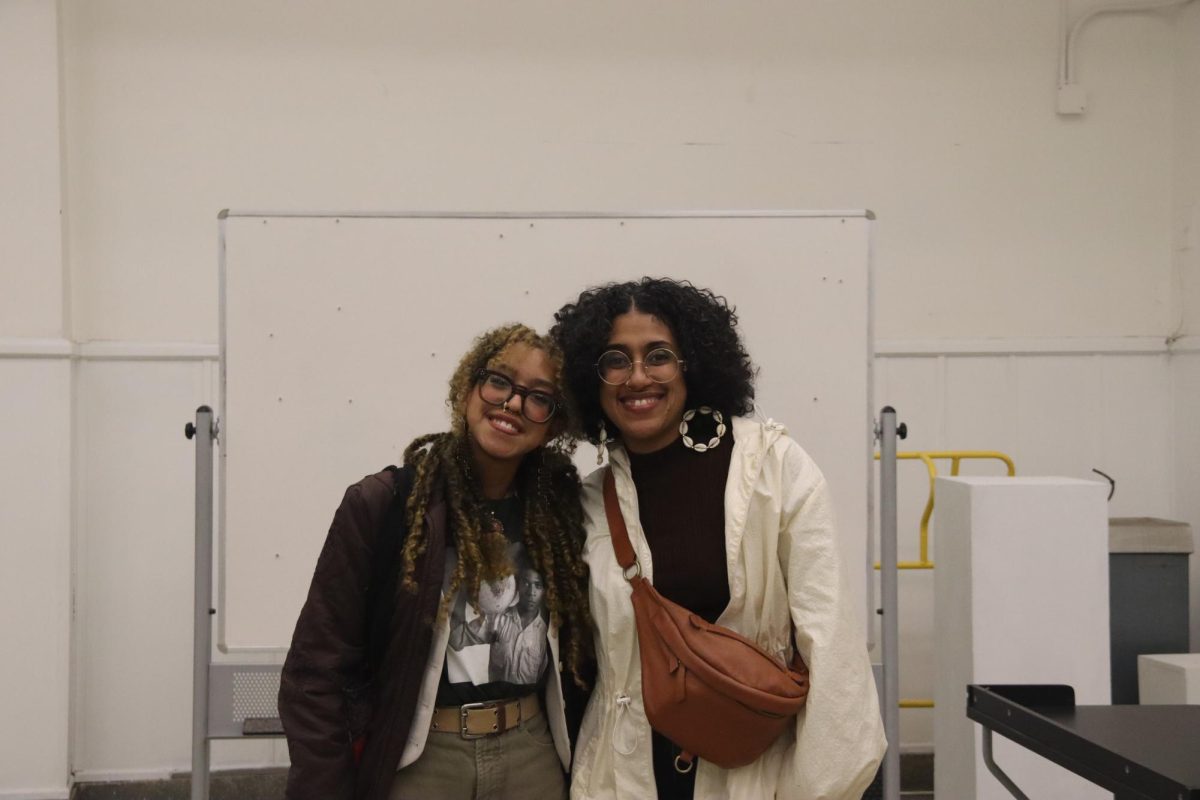 Laila Stevens (left) and Shani Peters (right) posing for photo after the Artist Talk event on March 19.
