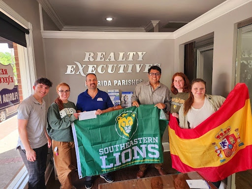 Members of the Spanish Club visited Sam DiVittorio, owner of Realty Executives Florida Parishes, who donated a substantial amount of money to promote the study abroad program in Salamanca, Spain. 
