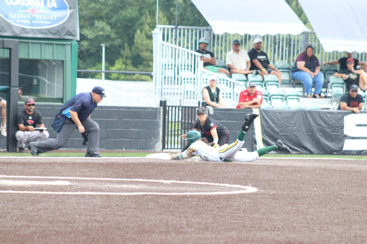 Senior SLU left fielder KaLyn Watson slides  safely into third base during the Lady Lions SLC Tournament Championship victory over UIW at North Oak Park. (May 10, 2024 - Hammond)