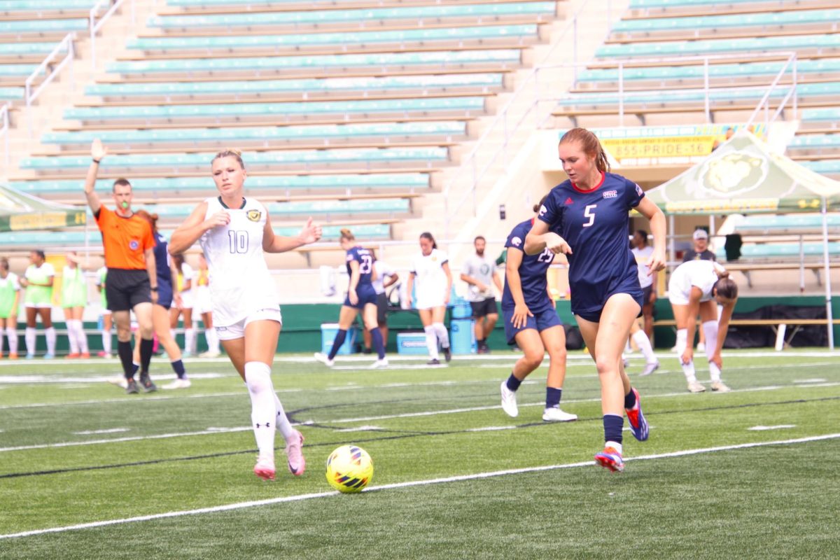 Graduate midfielder Katie brown jockeys for the ball against the South Alabama Jaguars. (Aug. 25, 2024 – Strawberry Stadium – Hammond)