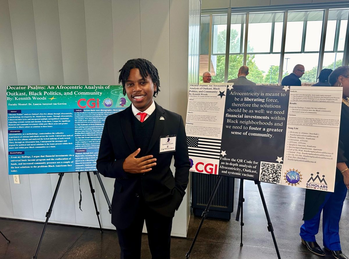 The Lion's Roar Editor-in-Chief Kennith Woods presents his research on Afrocentricity and OutKast at the LITE Center at the University of Louisiana at Lafayette. (Lafayette, LA - Friday, July 26, 2024)