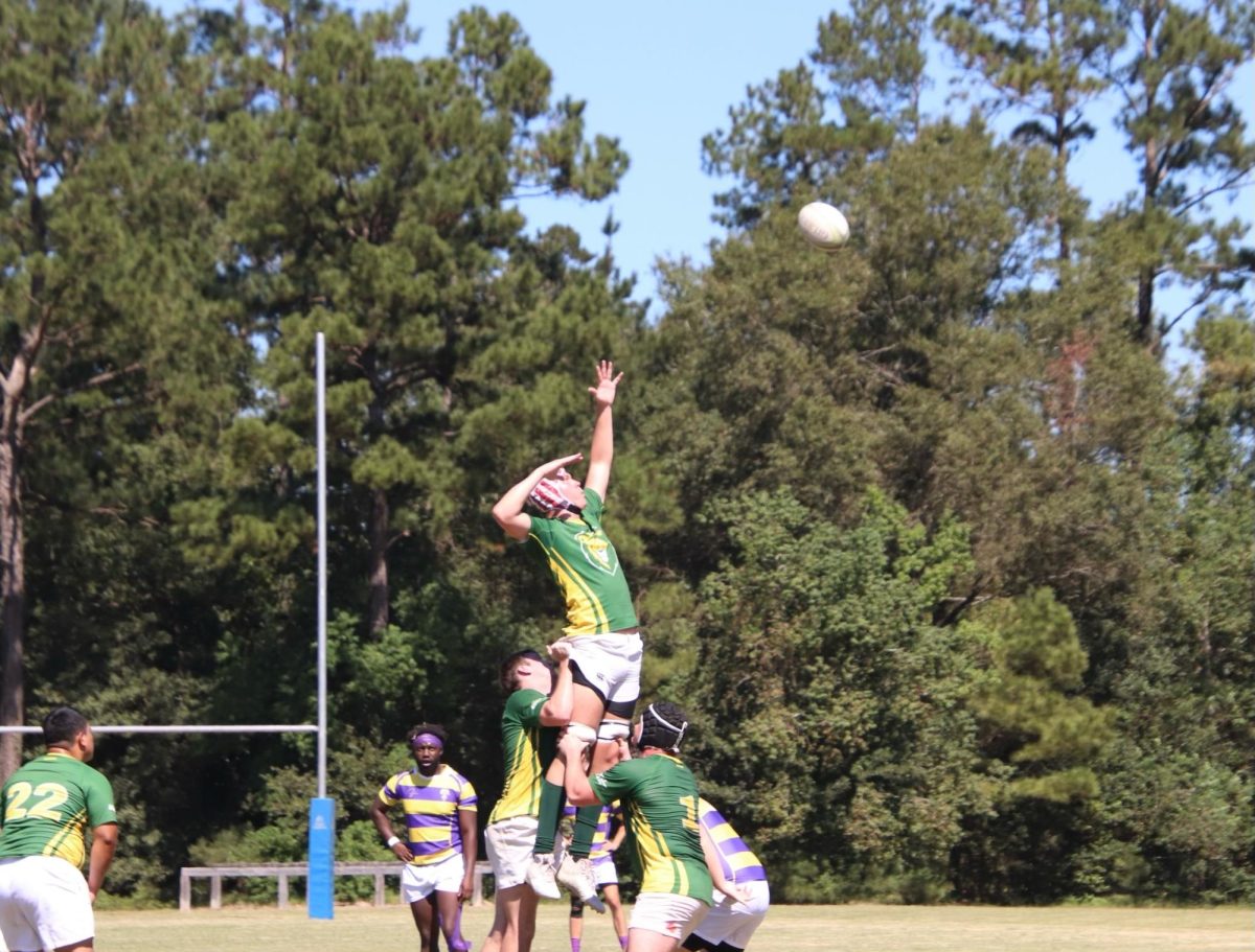 The SLU Rugby club hoisted their teammate into the sky, helping him reach for the ball against LSU. 

