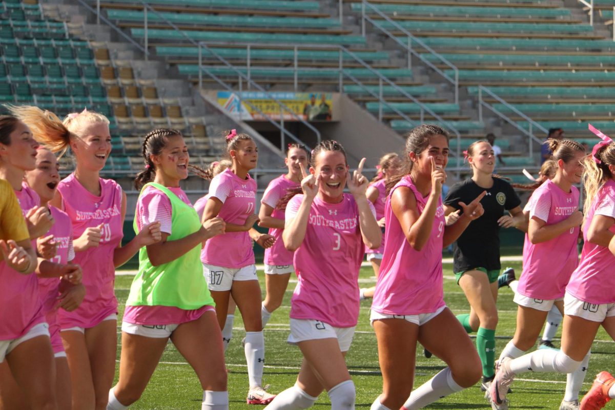 The Lady Lions are all smiles during warmups in their match against Northwestern State. (Hammond, La. - Sunday, Oct. 6, 2024)