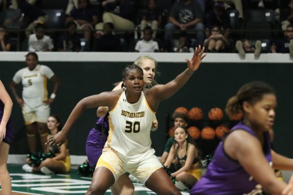 Junior forward Cheyanne Daniels calls for the ball in the post against Millsaps defender. (Hammond, La. - Nov. 6, 2023)