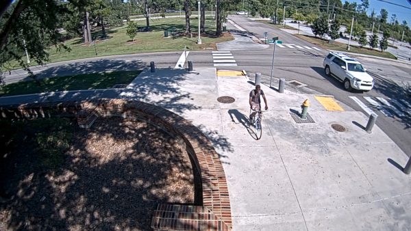 Person of interest seen riding bike near CSTB building. 

Courtesy of Southeastern security cameras