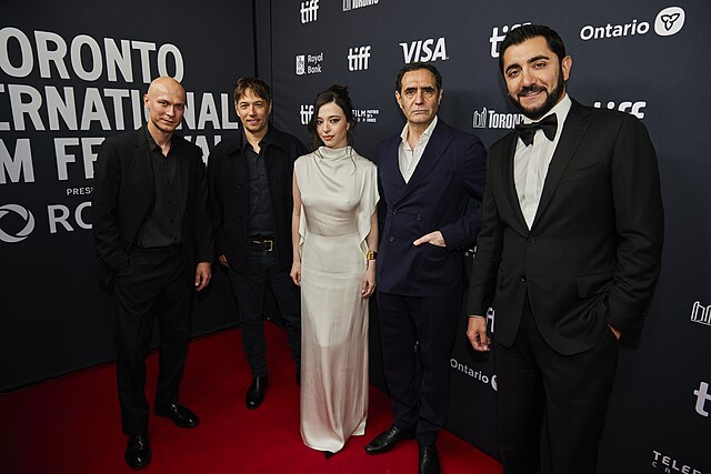 Sean Baker and the cast of his 2024 film "Anora" appear at the 2024 Toronto International Film Festival. From left: Yuriy Borisov, Sean Baker, Mikey Madison, Karren Karagulian and Vache Tovmasyan.