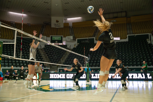 Hannah Brewer stretches her hand toward the skies to send a blitzing spike over the net. (Hammond, La. - Saturday, Nov. 2, 2024)