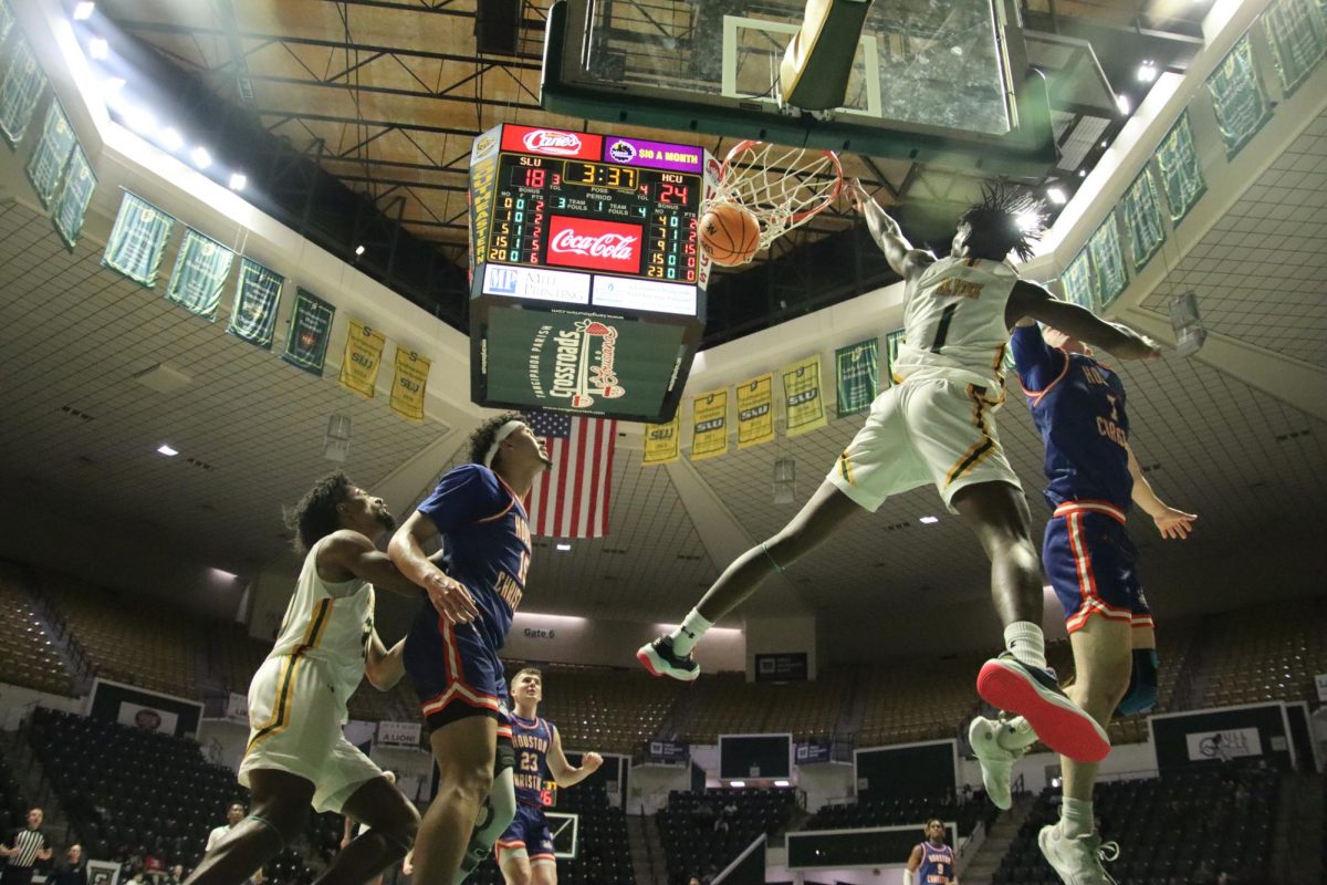 Freshman forward Jeremy Elyzee skies to the rim for a ridiculous slam against HCU.