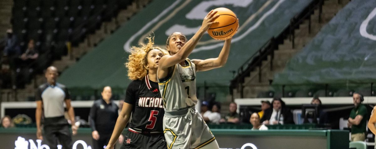 Junior SLU guard Jalencia Pierre blows by Nicholls defender for a finish at the rim. 