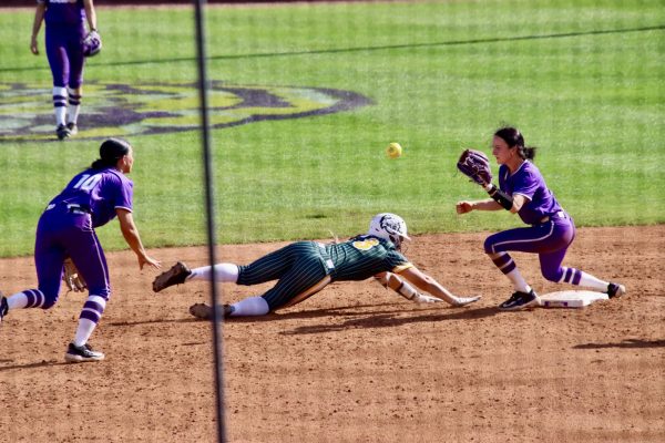 Junior infielder Maria Detillier makes a mad dive back to second.