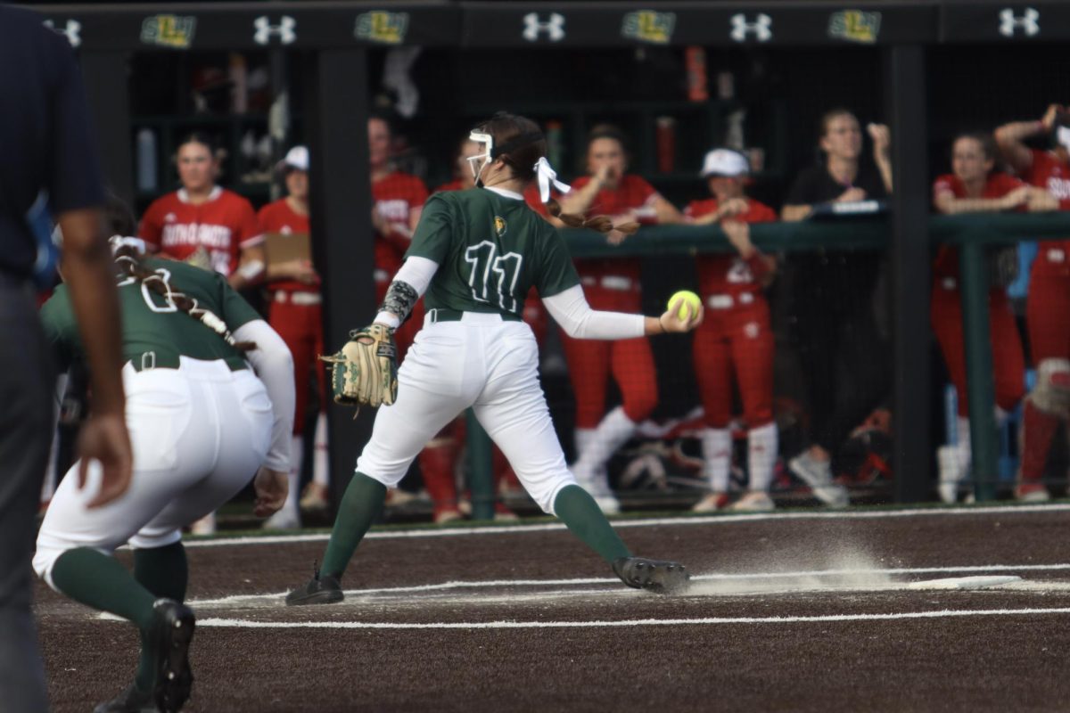 Redshirt freshman pitcher Hallie Burns slings a pitch toward home plate against South Dakota.