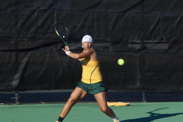 Sophomore Leana Gomez sets to send the ball rocketing back over the net during her singles match against Dillard. (Hammond, La. - Saturday, Feb. 1, 2025)