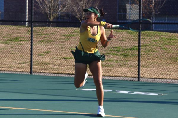 Junior Pantchakorn "Fresh" Suanarsa sends the ball rocketing back over the net during her singles match against Dillard. (Hammond, La. - Saturday, Feb. 1, 2025)